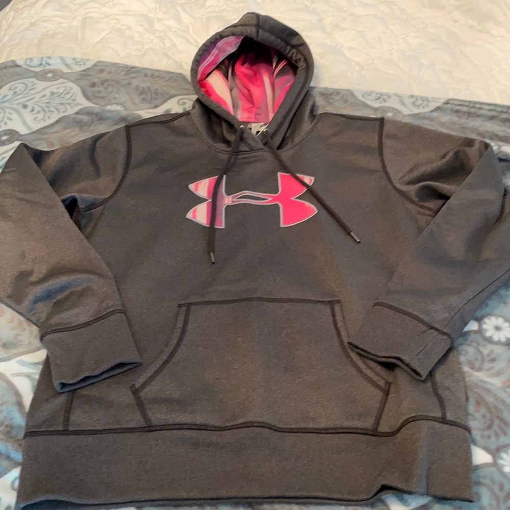 Under Armour gray and pink women’s hooded sweatshirt. Believe it’s size Large.
